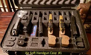 A case with many different types of guns in it.